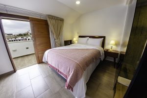 Cama doble Suite Mini del Hotel Boutique San Chiquinquirá