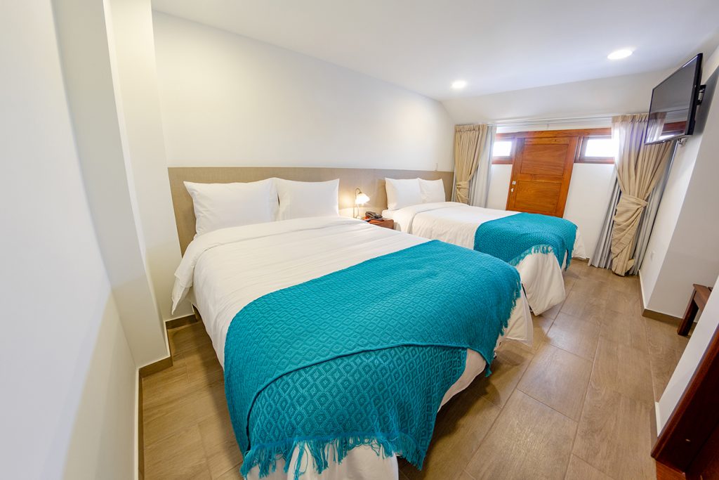 Dos camas Suite Deluxe del Hotel Boutique San Chiquinquirá
