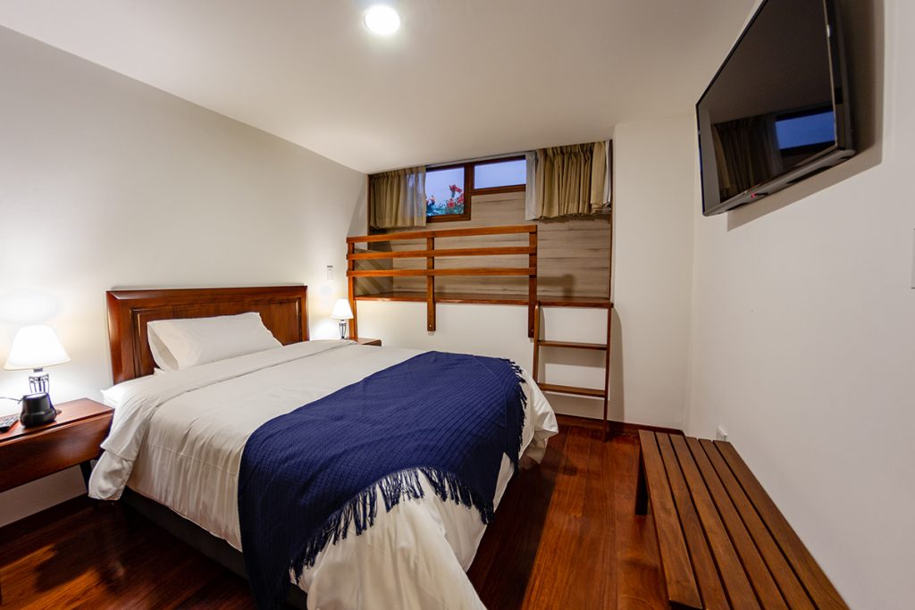 cama doble y camarote de hotel en Chiquinquira