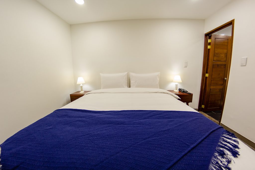 Cama queen del Hotel Boutique San Chiquinquirá